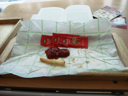 Three packets of ketchup